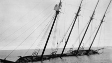 Photograph of the four-masted motor vessel, ARCTIC, crushed in an ice pack five miles south of Barrow, Alaska (1924)