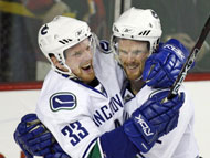 Daniel Sedin, right, leads the Canucks in scoring, but it was his twin brother Henrik who made the difference in Vancouver's most recent victory.