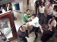 Surveillance video released by Vancouver police shows a nightclub bouncer being punched in the face. 