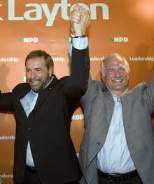 NDP candidate Thomas Mulcair celebrates with Jack Layton, the party's leader, in Outremont.  