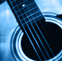 A photo of guitar closeup.