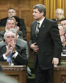 Conservative Leader Stephen Harper votes on the motion in the House of Commons Tuesday. (CP photo)