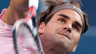 Roger Federer of Switzerland serves against Juan Ignacio Chela of Argentina on Tuesday. 