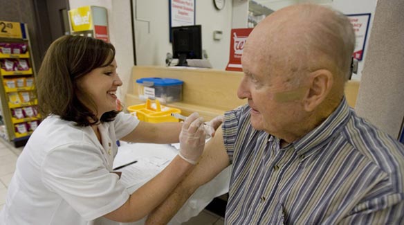 Am I more likely to get swine flu if I get a seasonal flu shot? You'll have to read on to find out. (Mary Ann Chastain/Associated Press)