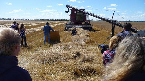 Paul Brandt used Ted and Maddi Dyck's combine as a prop for the video he shot on their field.