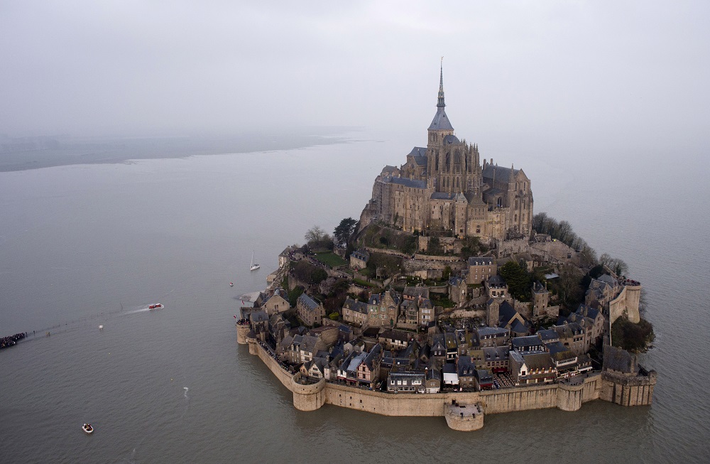 A supertide that occurs every 18 years submerges a narrow causeway leading to the Mont Saint-Michel, on France's northern coast.