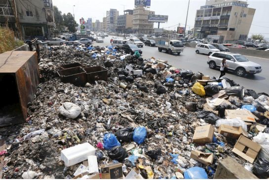 Garbage is piled along a highway in Beirut on Thursday, Sept. 3. A protest movement that began with rallies against the growing trash piles in the streets of Beirut garnered much support among the many Lebanese angered by the government’s failure to find a solution after the main landfill was closed in July.