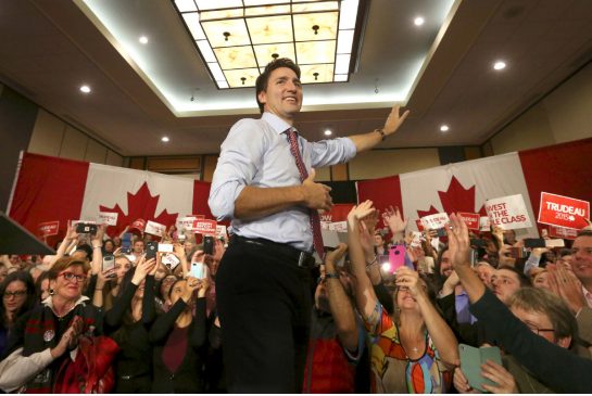 Prime minister-designate Justin Trudeau takes the stage during a rally in Ottawa last week. Trudeau has huge political capital, but may have some trouble delivering on all of his campaign promises, Tim Harper writes.