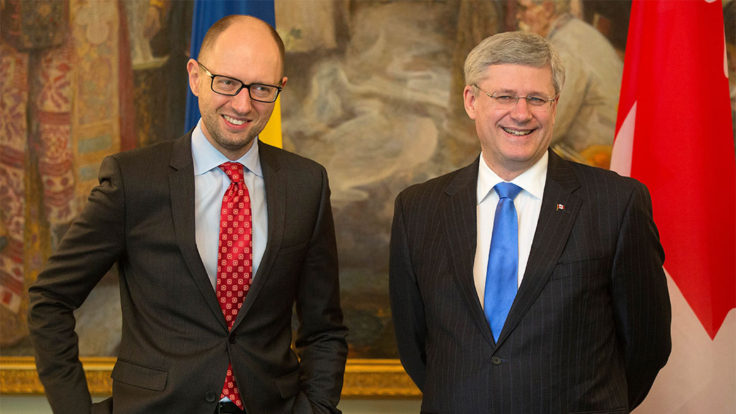 Prime Minister Stephen Harper is greeted by Arseniy Yatsenyuk, Prime Minister of Ukraine, upon his arrival at the Cabinet of Ministers.