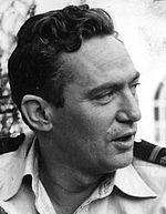 Black and white photo of Peter Finch during filming of the 1955 film, Passage Home.