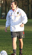 Coach on the pitch in training jacket