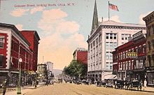 A tinted, colorized photo of wide city street