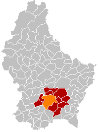 Map of Luxembourg with Luxembourg City highlighted in orange, the district in dark grey, and the canton in dark red