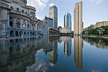 Reflecting pool with highrises in the background