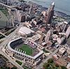 Cleveland with Progressive Field and Quiken Loans Arena in the foreground with Cleveland Browns Stadium in the background.