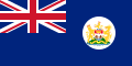 Navy Blue flag with Union Flag as top left quarter and crest on right side