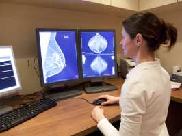 Having a little extra tissue taken off during breast cancer surgery greatly lowers the risk that some cancer will be left behind and require a second operation, according to a new study that could change care for more than 100,000 women in the United States alone each year.