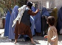 Taliban beating woman in public RAWA.jpg