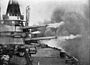 Brazilian battleship Minas Geraes firing a broadside.jpg