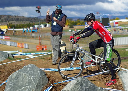 A rider in a the UCI Mountain Bike & Trials World Championships mountain bike trial receives a one point penalty for touching his foot to the ground