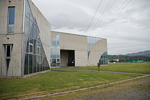 Photograph of a modernistic building.