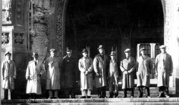 The Carving Team standing in front of the Entrance, ca. 1938.