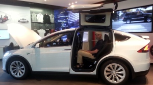 Don Pittis in a Tesla SUV