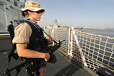 On April 26, 2009 a member of the Naval Boarding Party stands watch as Her Majesty's Canadian Ship (HMCS) Winnipeg participates in an SNMG1 port visit to Karachi Pakistan to increase awareness of NATO activities in the region.  Photo : Warrant Officer Carole Morissette