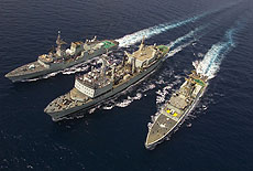 From right to left HMCS Algonquin,HMCS Protecteur and HMCS St-Johns. The formation took place during a (RAS) Replenishment at sea, followed by manouvers. Photo: MCpl Michel Durand  