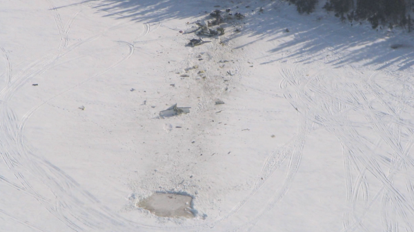 Still of an aircraft accident site, from the collisions with land and water video