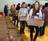 On December 19, 2014, Christmas Exchange Program volunteers helped pack food hampers for Ottawa families in need.