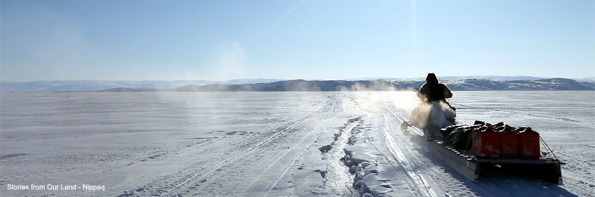 An Inuit hunter travels by snowmobile across the frozen sea. Photo taken from Stories from Our Land – Nippaq, a documentary short directed by Qajaaq Ellsworth in 2011. 