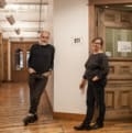 Barbara Gilbert et Marc Lemyre debout devant les nouveaux espaces du Labo