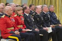 The Order of Merit of the Police Forces was created in 2000, to recognize conspicuous merit and exceptional service by members and employees of Canadian police forces whose contributions extend beyond protection of the community. Three levels of membership with post-nominal letters reflect long-term, outstanding service: Commander (C.O.M.), Officer (O.O.M.) and Member (M.O.M.). 
 