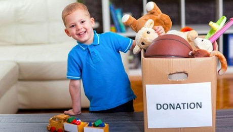 young-boy-with-donation-box