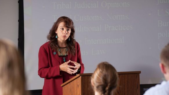 Angelique EagleWoman, shown teaching a class at the University of Idaho College of Law, became the first Indigenous dean of a Canadian law school when she was appointed to Lakehead University’s law faculty in 2016. Less than two years into the job, she has resigned, alleging systemic racism.
