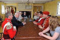 A discussion with His Excellency and Parks Canada interpretive guides on the importance of the War of 1812 today took place in the officer's quarters.