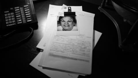 Des rapports de police avec la photo de Gladys Tolley.