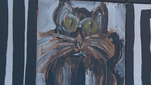 Une toile d'un artiste d'un Nouveau-Brunswick affiche un chat dans un labyrinthe. 