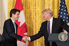 Justin Trudeau and Donald Trump shaking hands
