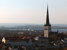 The spire of St. Olaf's Church in Tallinn looks over the city and the Gulf of Finland