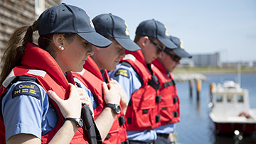 4 Canadian Coast Guard students in line.