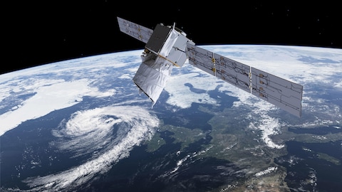 Une représentation artistique d'un satellite en orbite de la Terre.