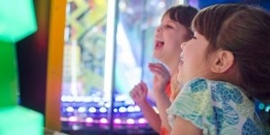 bright-colors-fun-person-play-happy-kids-arcade-neon-lights-excited-laughter-arcade-games_t20