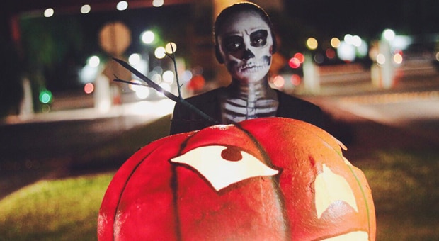 A teen girl in a Halloween costume