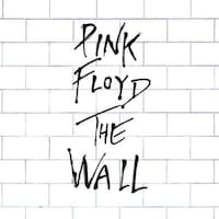 « Pink Floyd The Wall » inscrit en noir sur un dessin représentant un mur de briques blanches.