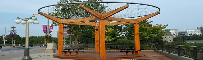 The Gather-Ring, by Manuel A. Baez and Charlynne Lafontaine, on the Portage Bridge Plaza.