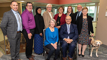 Picture of Accessibility Standards Canada’s CEO and board members. First row, from left to right: the Vice-Chair: Mary Reid, the Chair, Paul-Claude Bérubé and Penny Hartin, director. Second row, from left to right: the CEO, Philip Rizcallah, Kory L. Earle, director, Rabia S. Khedr, director, William Adair, director, Laurie Ringaert, director, Maureen Haan, director and Dr. Joe McLaughlin, director. Missing on this photo: Brad McCannell, director.
