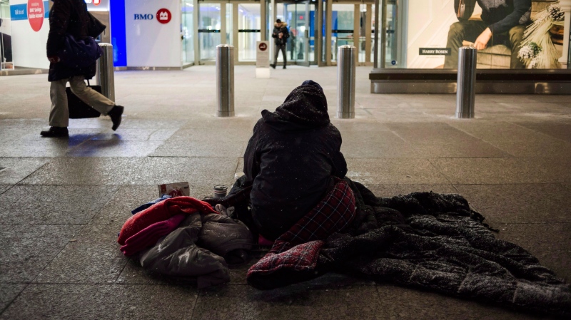 A homeless person is seen in downtown Toronto, on Wednesday, January 3, 2018. THE CANADIAN PRESS/Christopher Katsarov