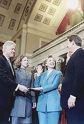 Clinton being sworn in as U.S. Senator by Vice President Al Gore in 2000. Her husband Bill and daughter Chelsea are looking on.